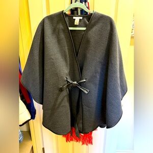 Grey cape with faux leather belt.